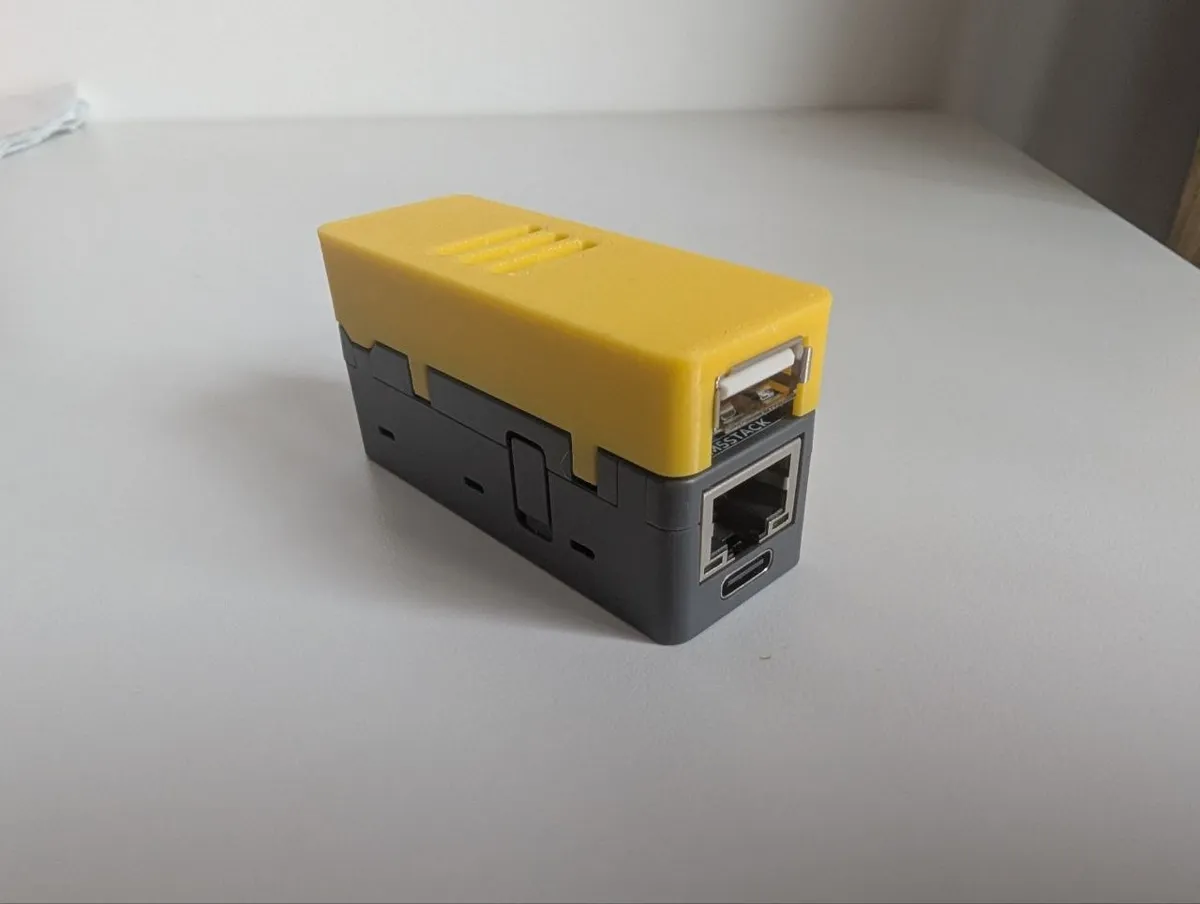The other end: the add-on's USB-A port above the Unit PoE-P4's Ethernet and USB-C.